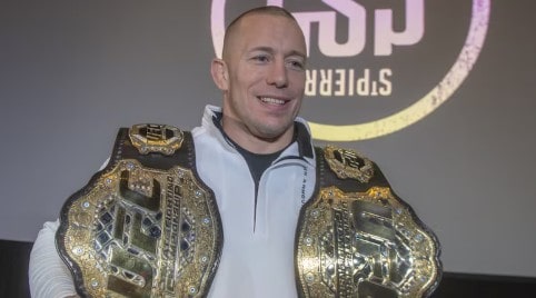 Georges St-Pierre with champion title belts